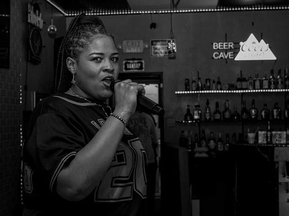 Dream performing in DREAM #20 jersey at Texas venue with Dos Equis sign visible