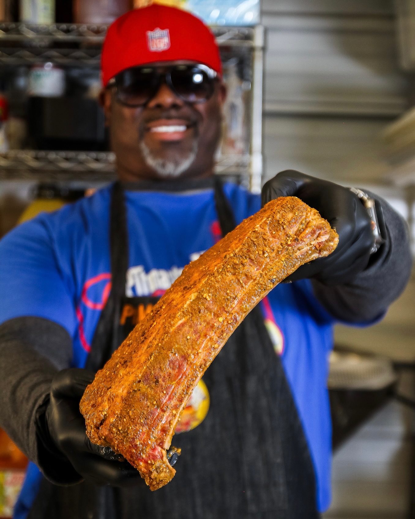 Taterque pitmaster with fresh-smoked BBQ